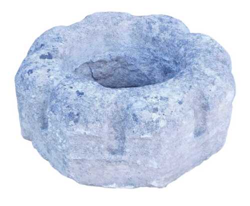 A stone well head, possible Medieval, of crenellated circular form, 58cm wide.