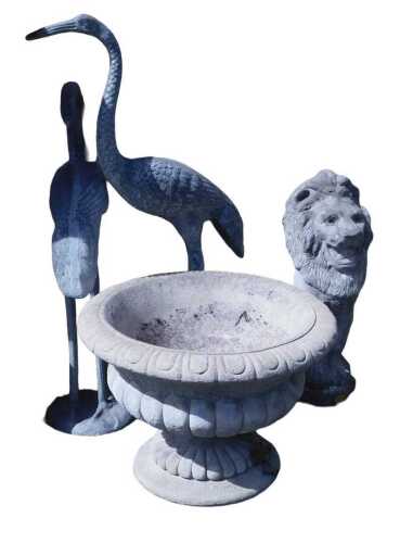 A Cotstone Products reconstituted stone garden urn, of fluted form, 47cm wide, together with a...