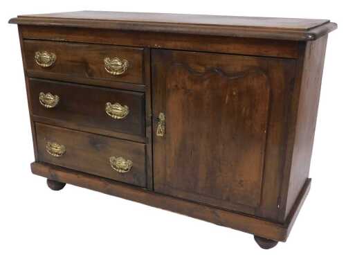 A late 19thC Lincolnshire scumbled pine dresser, the top over three graduated drawers, flanked...