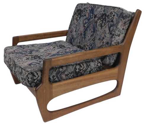 A 1960s teak lounge chair, with a Pirelli Limited tyre rubber seat cushion support, and...