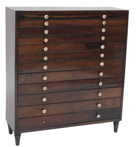 A Victorian rosewood collector's chest, of twelve drawers, with turned bone handles, raised on...