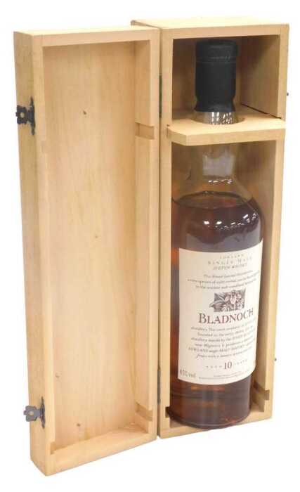 A bottle of Bladnoch Lowland single malt scotch whisky, aged 10 years, in a fitted box.