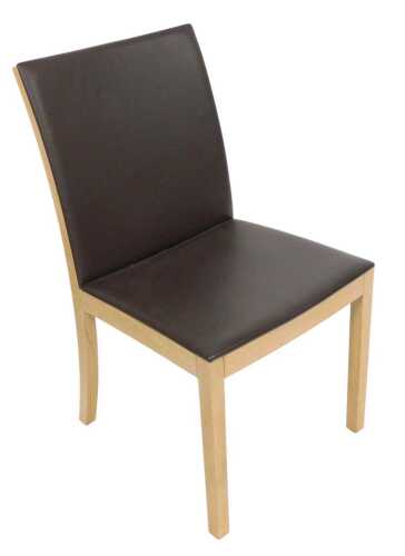 A Hulsta light beech single dining chair, with a brown leather upholstered seat and back.