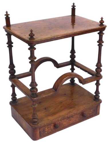A Victorian walnut and inlaid Canterbury, of rectangular section, raised on turned supports,...