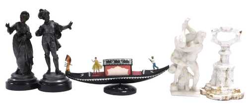 A pair of 19thC polished spelter figures of a gentleman and a lady, 26cm and 25cm high, a white...