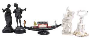 A pair of 19thC polished spelter figures of a gentleman and a lady, 26cm and 25cm high, a white...