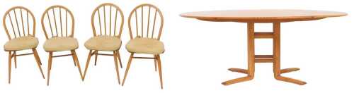 A set of four Ercol light elm Windsor dining chairs, model number 2056, with loose cushion seats,...