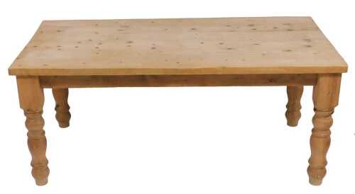 A pine farmhouse kitchen table, raised on turned legs, 78cm high, 183cm wide, 91cm deep.