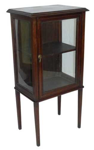 A late Victorian mahogany display cabinet, with ebony and boxwood barber's pole banding, with a...