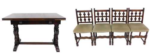 An oak draw leaf dining table, raised on turned supports united by a cross stretcher, 77cm high,...