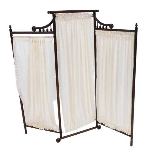 A Victorian beech two fold modesty screen, with cream fabric, raised on straight and scroll feet,...