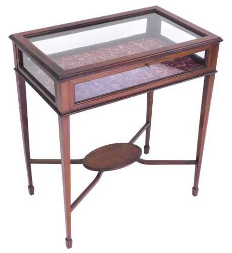 An Edwardian mahogany bijouterie cabinet, with boxwood line inlay, with a glazed top and sides,...