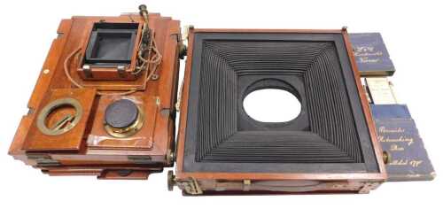 Assorted late 19th/early 20thC box camera parts, to include numbered plates, bellows, etc.