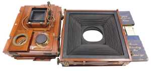 Assorted late 19th/early 20thC box camera parts, to include numbered plates, bellows, etc.