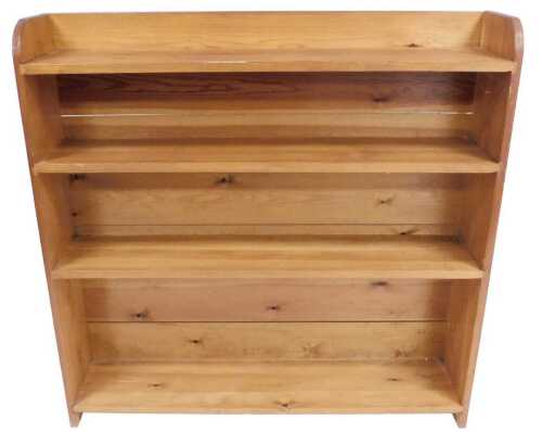 A pine open bookcase, of four shelves, 100cm high, 103cm wide, 23cm deep.