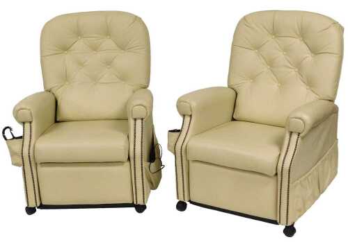 A pair of C&R Wall Furniture cream leather recliner chairs, 78cm wide.