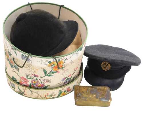 A WWI Princess Mary brass Christmas tin 1914, RAF cap, and a riding helmet. (3)