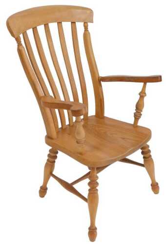 A beech and elm lath back kitchen chair, with a solid saddle seat, raised on turned legs united...