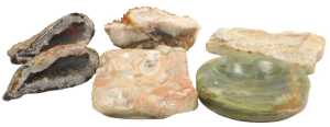 A quartz geode, in two parts, each approx 14cm long, a sample of quartz, and three onyx ashtrays....