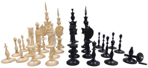 A 19thC German bone chess set, of Selenus form, incomplete, king 11cm high. (AF)