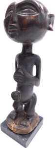 An African tribal Congolese Tabwa figure, raised on a stone plinth, 23cm high. - 2