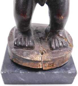 An African tribal Congolese Tabwa figure, raised on a stone plinth, 23cm high. - 3