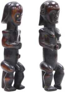 A pair of Gabonese Fang tribal reliquary male and female figures, 29cm high.