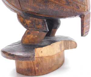 A carved tribal figure of a flightless bird, on an oval base, 26cm high. (AF) - 3