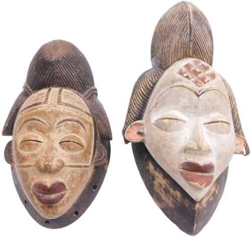 A Gabonese Punu tribal mask, with a cream painted face embellished in red and pink, 32cm high,...