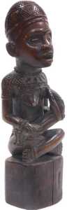 An African Yombe Congolese maternity figure, raised on a tapering base, 33cm high.
