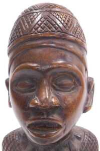 An African Yombe Congolese maternity figure, raised on a tapering base, 33cm high. - 3