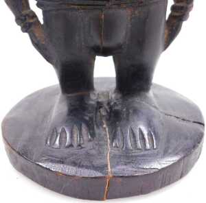 A pair of African Yoruba fertility figures, each with a tapering hat, and circular base,... - 3