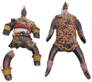 Two similar Cameroonian Namji carved wooden fertility dolls, each embellished with beads. (1 AF)