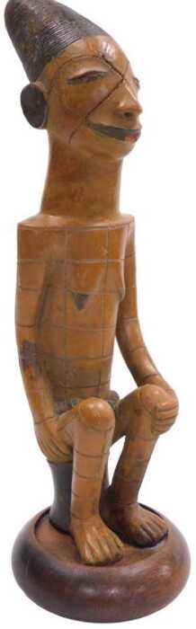 An African Congolese Mangbetu terracotta seated figure, on an associated wooden base, 38cm high.