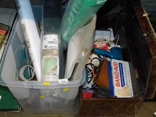 A polytunnel, and wooden tool box.