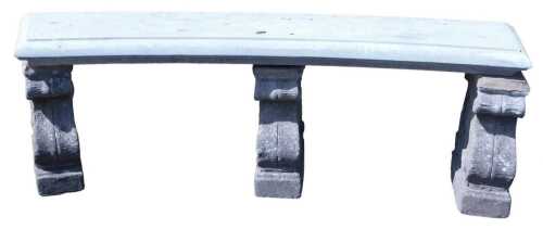 A stone garden bench, with a curved top, raised on three scroll supports, 48cm high x 152cm wide...