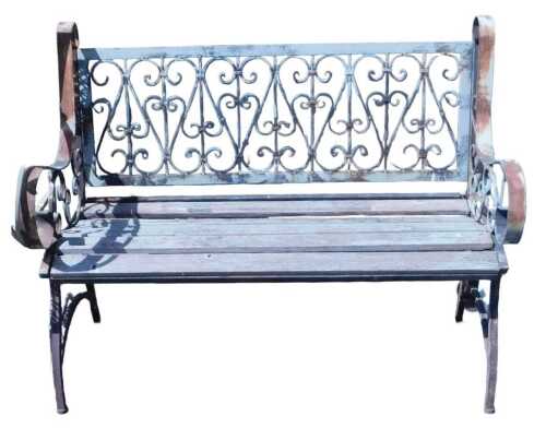 A cast iron garden bench, the back with openwork scrolling decoration, with scrolling arms, and...