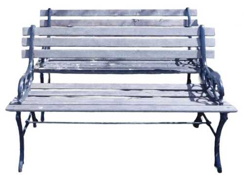 A pair of wooden slatted garden benches, with black painted cast iron scroll ends, 122cm wide.