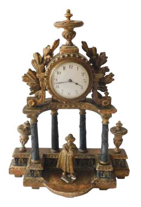 An early 19thC French giltwood mantel clock, the 9cm diameter enamel Arabic dial, held in a...
