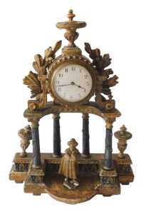 An early 19thC French giltwood mantel clock, the 9cm diameter enamel Arabic dial, held in a...
