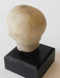 An ancient Greek alabaster head, on an ebonised base, 14cm high. Offsite Sale - Buying &... - 3