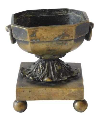 A 19thC gilt bronze Italian Grand Tour style open salt, of octagonal form with ring handles, on...