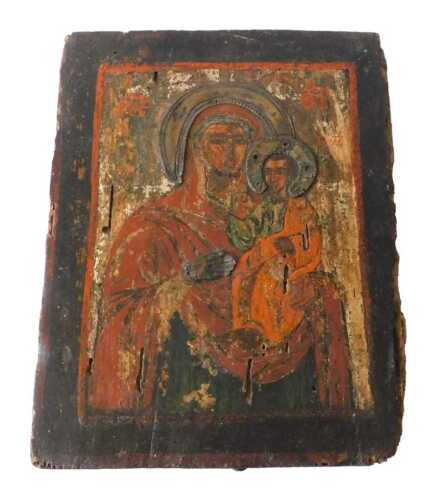 An 18thC Russian icon of Christ and The Virgin Mary, polychrome wooden panel with metal overlay,...