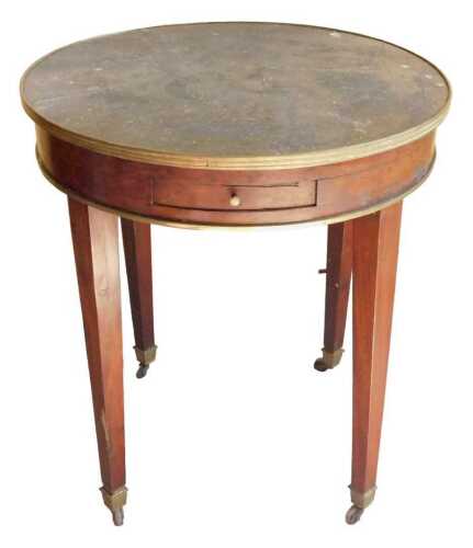 A 19thC Louis XVI style mahogany table, the grey fossilised marble top with a brass border, with...