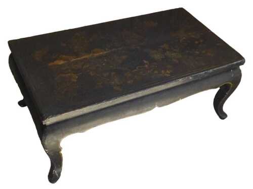 A chinoiserie decorated black painted low table or coffee table, the rectangular top profusely...