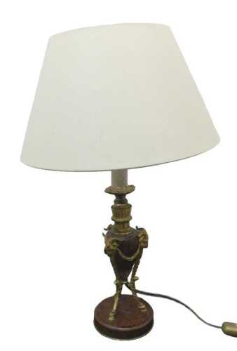 A 19thC French ormolu mounted and red marble finish lamp base, with ram's head and floral...