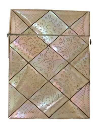 A 19thC mother-of-pearl card case, of rectangular form, with a diamond scroll and floral...