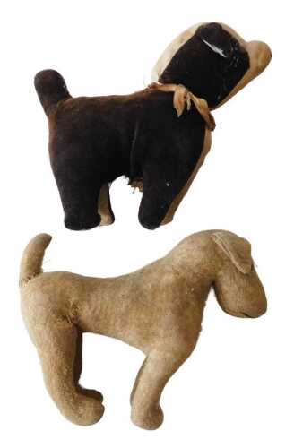 An early 20thC straw filled soft toy dog, 21cm wide, and another. (2, AF) Offsite Sale - Buying...