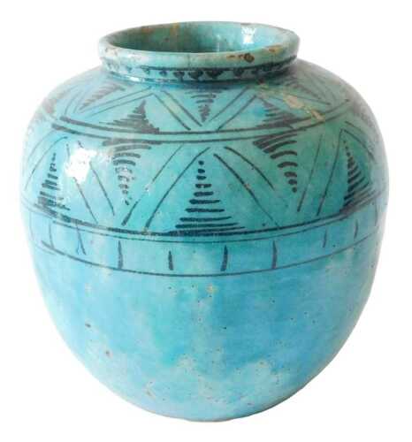 A Middle Eastern Persian Kashan style pottery jar, of circular shouldered form, with a geometric...