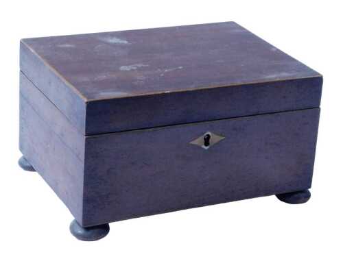 An early 19thC mahogany and boxwood strung workbox, the rectangular hinged lid enclosing a tray,...